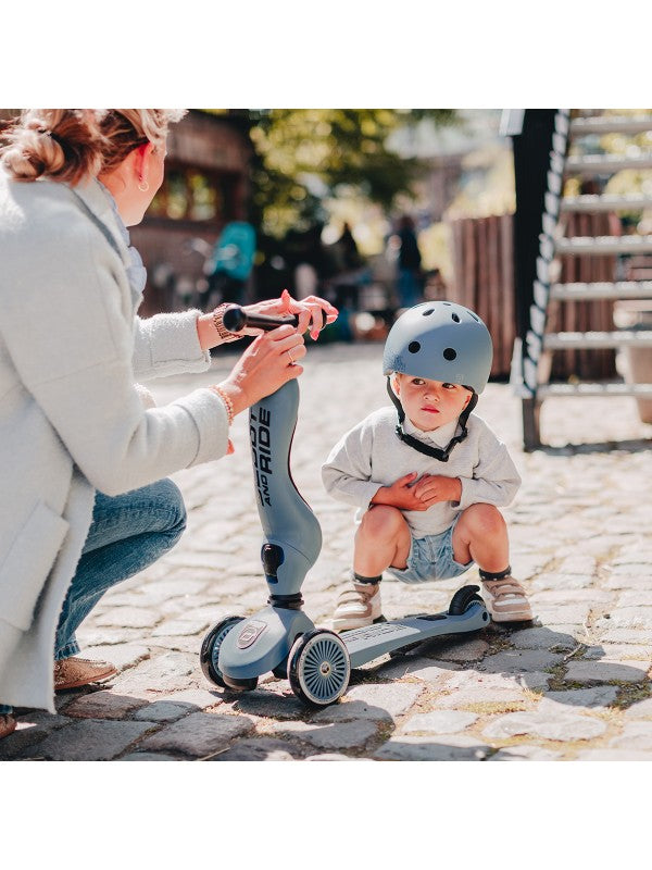 Scoot and Ride - Highwaykick 1 - Steel being used by a child wearing a helmet in an outdoor setting.